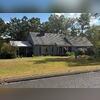 Here's a look at Richard's roof from the front before replacement. Swipe to see the transformation!