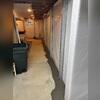 We also wrapped the walls with our CleanSpace vapor barrier to help keep moisture at bay. The vapor barrier is tucked into the subfloor drainage system, which will channel wall leaks down to the sump pump.