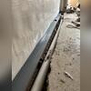 WaterGuard was installed along the perimeter of the basement to collect any moisture intrusion and direct it to the sump pump for removal.