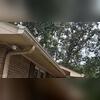 This before picture shows the black streaks on this homeowners old gutter system indicating water overflowing and spilling out of the gutters signaling clogging somewhere in his current gutter protection system.