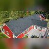 These shingles are from IKO Roofing, and they are from their Dynasty collection. This particular color is in the Granite Black shade.