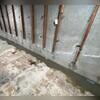 WaterGuard is installed along the perimeter of the basement floor and covered in fresh concrete to provide a seamless finished look. The WaterGuard Port is left visible to provide access to the system when needed.