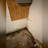 This basement had no way of preventing water from getting in. Signs of damage included standing water, water stains and mold.