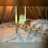 This degraded blown-in fiberglass did not provide enough R-Value to block drafts effectively.