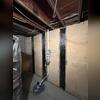 CarbonArmor straps provide permanent stabilization to this foundation wall, preventing further movement and restoring structural integrity.