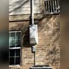 A durable, covered radon fan was mounted outside the home to ensure consistent system performance while maintaining an aesthetic appearance.