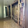 Old crumbling and shifting brick foundation wall in Belfast, Maine