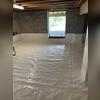 We seal our CleanSpace Liner in place, so your home is completely isolated from the earth!