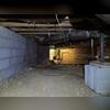 This Pittsboro, NC crawl space showed clear signs of structural instability, including improper support methods and unleveled ground conditions. Temporary materials, such as stacked cinder blocks, were being used in place of a professional foundation support system, which can lead to sagging...