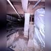 During our inspection, we found that the floor joists in the crawl space were unsupported.