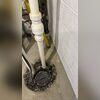 Existing sump pit used as part of the mitigation design, creating an efficient and low-maintenance suction point for radon reduction.