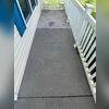 The concrete porch on this home was covered in grime.