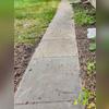 Winter maintenance was a headache for this Vinton, IA homeowner due to these significantly uneven sidewalk slabs. Not only was the surface a tripping hazard, but navigating a snow blower across the severe bumps was a big frustration.