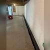 Partially installed WaterGuard demonstrates how the system manages basement moisture.