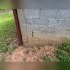 The Design Technician found symptoms of foundation settling in the foundation wall.