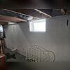 The basement walls before the project.