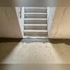 TrenchDrain is installed in front of the basement door that leads outside to catch excess and surface water. It is connected to the WaterGuard drainage system.
