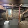 Here you can see the stone walls that were exposed before we installed our CleanSpace Wall System. It is perfect for stone walls since they are not flat and have texture because of how pliable it is.