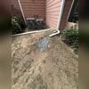 We walked the property to see how the downspout/down spout extensions were previously installed. We have some recommendations for a way to make the downspout extensions blend with the surrounding landscaping and be more visually appealing.