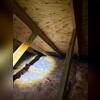 The rolled fiberglass in this attic was a great DIY at first, but quickly made the attic dysfunctional.