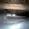 The reflective insulation works alongside the vapor barrier to maintain a dry environment.