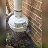 A powerful radon fan was mounted to ensure continuous airflow, directing harmful gases safely outside the Wilmington home.