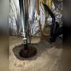 The homeowner's old sump pump was contributing to the water seepage because it was failing to evacuate water efficiently or reliably. An outdated or broken pump cannot keep up with heavy rainfall, allowing water to back up, rise, and seep into the crawl space, thereby nullifying any existing...