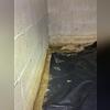 Moisture, mold, and a failing vapor barrier are problems in this crawl space, which hasn't been properly sealed. The encapsulation treatment totally separates and protects the crawl space interior from outdoor conditions, keeping the space clean and dry.