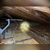 Some areas of this attic had little to no insulation protecting the rest of the home from drafts.