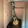 TripleSafe sump pump was installed in the corner of the basement to pump out the severe flooding.