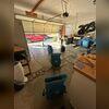 An overflow in the upstairs bathroom left allowed water to seep into the garage ceiling below.  Dehumidifiers and drying fans were used to decrease moisture levels and stabilize the area.
