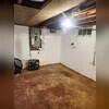 This image highlights the condition of the basement before our comprehensive waterproofing solution. Occasional water intrusion was creating uncomfortable and unhealthy living conditions. This space was clearly in need of a professional waterproofing solution to ensure a dry, livable environment.