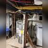 The existing wooden supports and temporary lally columns, originally intended as permanent structural elements, were inadequate for properly transferring loads and supporting the floors above the basement. This compromised stability and increased the risk of structural settlement over time.