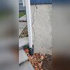 Vertical cracking observed in the garage foundation wall is indicative of differential settlement and potential structural distress. These conditions compromise the wall's load-bearing capacity, placing the overall structural integrity at risk. Immediate stabilization measures are recommended to...