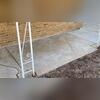 A cosmetic surface seal was applied to improve the appearance of repaired concrete.