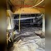 This photo captures the crawl space exactly as our team found it dark, damp, and poorly protected. The original thin plastic liner is torn, shifted, and no longer serving as a true moisture barrier. Exposed soil, open block walls, and scattered wiring created the perfect environment for humidity,...