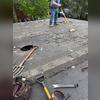Our professional roof replacement team is safely removing all of the old asphalt and underlayment to expose the decking. Once they finish this, they will inspect the remainder of the roof and replace any boards that need attention.