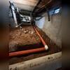 A complete drainage system was installed inside the crawl space.