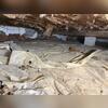 This crawl space had water leakage from the cinder block wall, causing high humidity in the air. This was degrading the insulation in the floor joists.