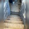 TrenchDrain was installed by the entry way to capture any moisture leaks before it spreads to the rest of the basement.