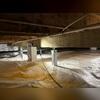 SmartJacks were installed to support the crawl space beams. Each post is adjustable, ensuring its secure.