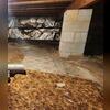 The crew arrived on the job to find that the crawl space had been lined with a thin plastic liner that was torn and allowing water to enter. The insulation was also showing signs of wear and moisture damage.