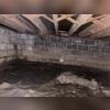 This crawl space had no way of moving water away from it, causing standing water, stains and mold.
