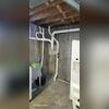 The suction point was installed in the basement laundry room.