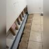 WaterGuard was installed along the perimeter of the basement to direct the water seeping from the walls and floors to the sump pump for removal.