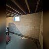 WaterGuard was installed around the perimeter of the basement to direct seeping water from the walls and floors to the sump pump for removal.