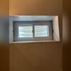The Everlast Window Insert was installed to keep out drafts and moisture from leaking into the basement.