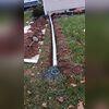LawnScape was installed on the lawn to direct floodwater from the basement away from the home's foundation.