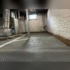 Drainage Matting was laid down across the floor of the basement to eliminate any standing water.