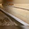 The finished WaterGuard perimeter drainage system sits discreetly along the floor's edge, keeping the basement dry without affecting usable space.
